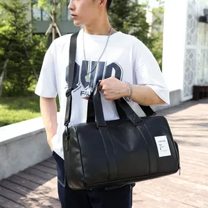 Sac de voyage élégant en cuir PU noir imperméable pour le sport et les courts séjours