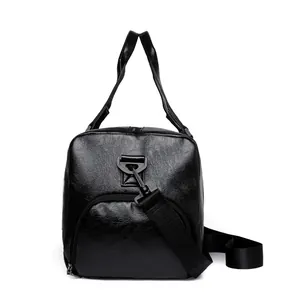 Sac de voyage imperméable en cuir PU noir pour le fitness et le sport avec bandoulière