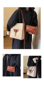 Detailed view of the large tote and crossbody bag set with stylish elephant charm