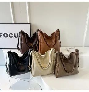 Detailed display of vintage large capacity bucket bags in five colors with textured PU leather