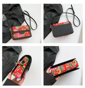 Detailed views of red floral crossbody bag with traditional peony patterns and black strap