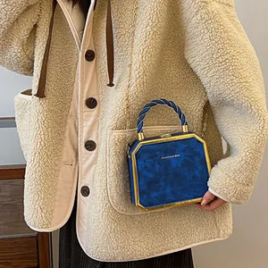 Elegant navy blue marble pattern hard shell crossbody bag with golden chain strap