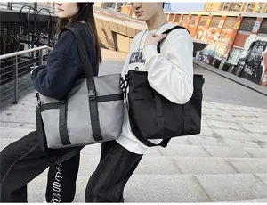 Grands sacs fourre-tout Oxford gris et noirs avec bandoulières réglables à l'extérieur