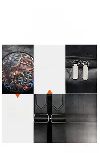 Detail of soft black leather backpack showing elephant embroidery and silver hardware