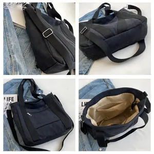 Black canvas tote bag with adjustable shoulder strap shown in a multi-angle layout