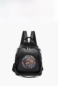 Front view of black PU leather backpack featuring a vintage colorful elephant graphic