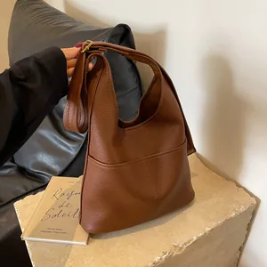 Brown litchi grain leather hobo shoulder bag with adjustable gold buckle and large capacity