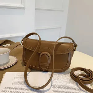 Sacoche selle rétro en cuir marron avec bandoulière, petit sac à main vintage chic