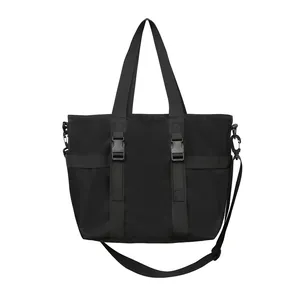 Grand sac fourre-tout noir en tissu Oxford avec boucles utilitaires et bandoulière réglable