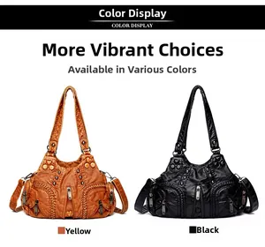 Detail view of vintage washed leather bags with multiple zippers and heart pendants