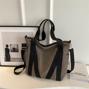 Large capacity canvas tote bag in khaki gray with black straps for commute