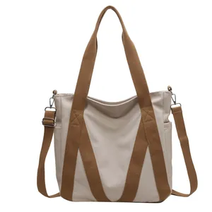 Large capacity canvas tote bag with brown straps and detachable shoulder strap
