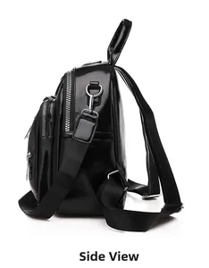 Vue latérale d'un mini sac à dos noir en cuir PU brillant avec fermetures éclair