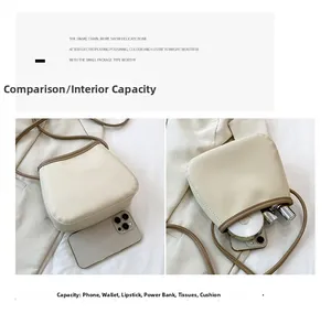 Vue détaillée du sac seau crème montrant l'espace pour téléphone et maquillage