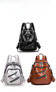 Comparaison détaillée de sacs à dos en cuir PU brillant en noir, argent et marron