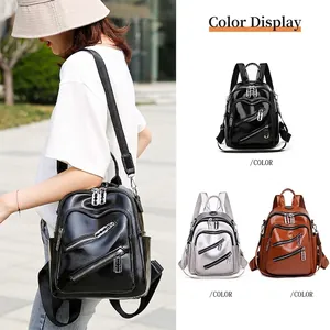 Sac à dos tendance en cuir PU pour femme en coloris noir, argent et marron