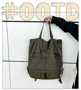 Nahaufnahme der olivgrünen Ripstop-Nylon-Tasche mit Doppelreißverschluss und Griffen