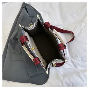 Top view of large tote bag interior showing spacious main compartment and zipper pocket