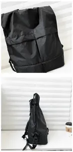 Detailansicht des schwarzen wasserfesten Nylon-Rucksacks mit Multi-Taschen und Schnallen