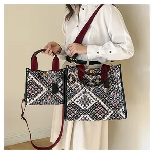 Detail view of ethnic canvas tote bags in two sizes with geometric woven patterns