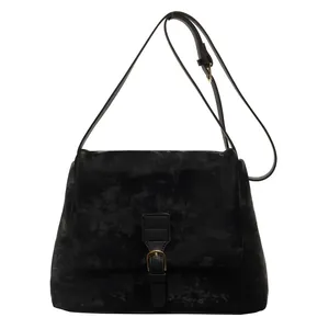 Retro black faux suede messenger bag with gold metal buckle and adjustable shoulder strap