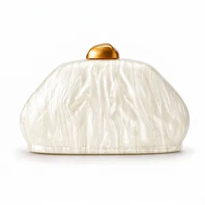 Elegant shell-shaped acrylic evening clutch with marble texture and gold metal buckle