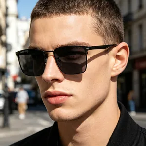 Side view of matte black polarized sunglasses on model with urban city street background