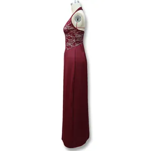 Close-up of wine red lace bodice and smooth satin fabric on a formal maxi dress