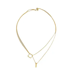 Double-layered gold geometric necklace featuring square pendant and vertical metal bar