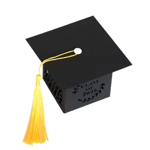 Black graduation cap favor box with yellow tassel and Class of 2026 cutout detail