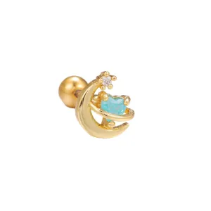 Golden moon and star cartilage stud earring with a blue heart stone and sphere back