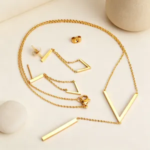 Minimalist gold-plated stainless steel jewelry set with V-shaped chain necklace and earrings