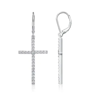 Macro view of S925 sterling silver cross earrings featuring micro-pave moissanite stones