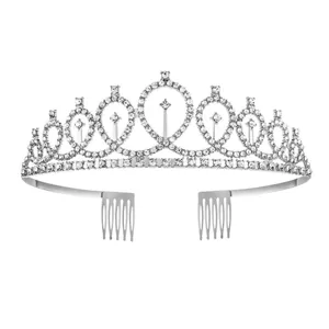 Elegant silver birthday tiara with rhinestones and hair combs on a white background