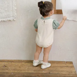 Baby girl summer bodysuit with puff sleeves in traditional Chinese minimalist style