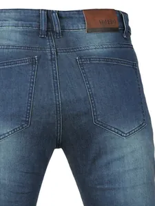 Rear view of Cordura denim motorcycle jeans featuring protective padding and leather logo