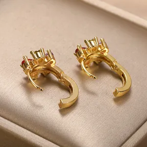 Elegant gold flower petal earrings with colorful zircons in luxury champagne box