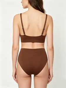 Rear view of seamless deep brown wireless bra and high-waist panty set on model