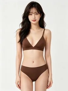 Front view of a brown two-piece seamless lingerie set with thin straps and a minimalist design