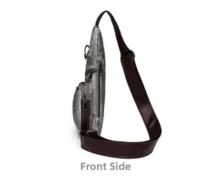 Détail de face d'un sac de poitrine vintage gris avec cuir brun et fermetures éclair