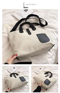 Close-up of white canvas tote bag with black leather pocket and snap button closure