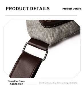 Détail de la boucle en métal argenté durable et de la bandoulière en cuir marron du sac