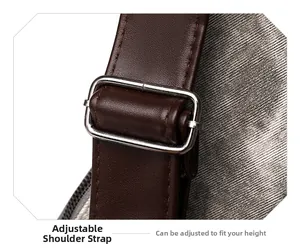 Détail de la bandoulière réglable en cuir avec boucle argentée sur un sac gris chic
