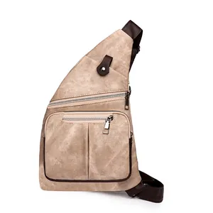 Sac de poitrine rétro en cuir souple kaki avec bandoulière marron et fermetures éclair