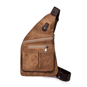 Sac de poitrine vintage marron avec compartiments zippés et bandoulière ajustable