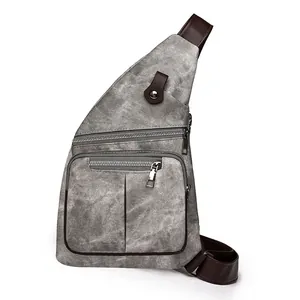 Sac bandoulière en toile grise pour homme avec sangles en cuir et poches zippées