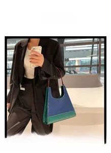 Sac à main rétro en similicuir avec blocs de couleurs et fines lanières rouges