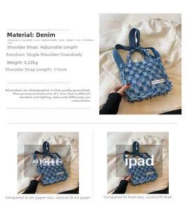 Detail of blue denim checkered tote showing fringe edges and adjustable shoulder strap