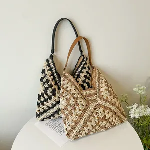 Detail of woven straw tote bags featuring geometric crochet patterns and leather straps
