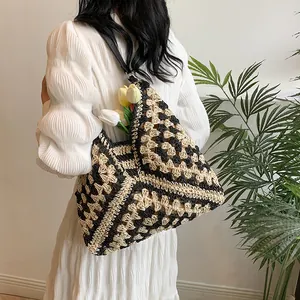 Detail of handmade crochet tote bag with geometric woven pattern and spacious opening